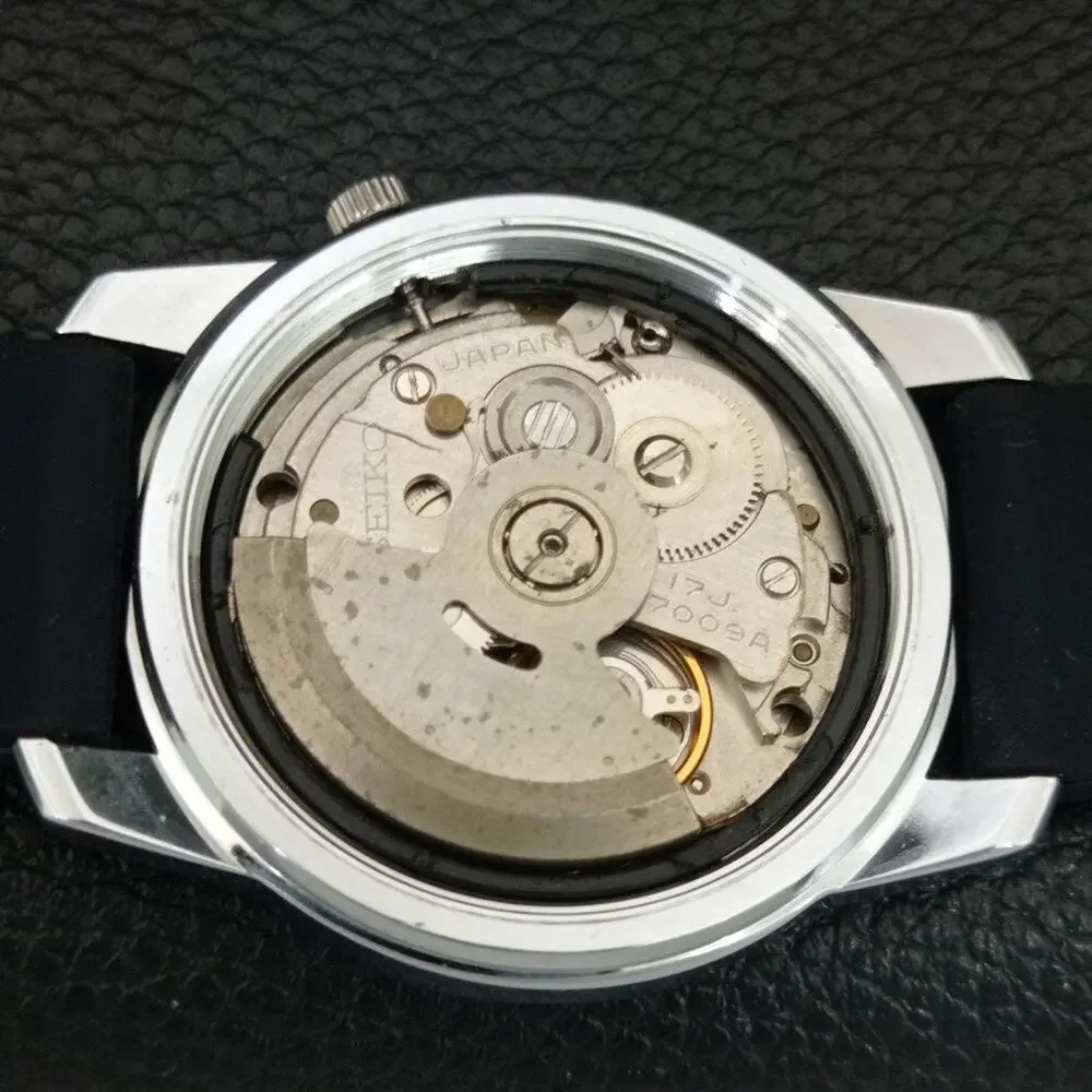 Vintage 1973 Seiko Automatic Mens Silver Watch W/daydate & White accents